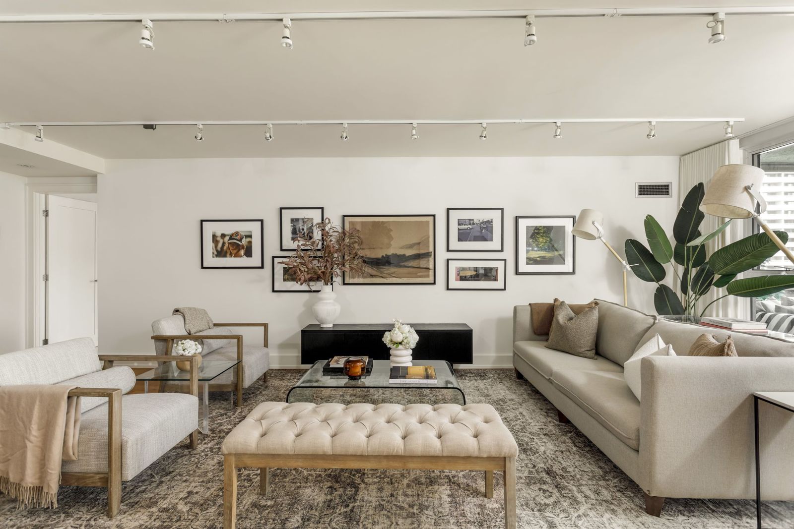 Living room with a gallery wall, Bloor Street East