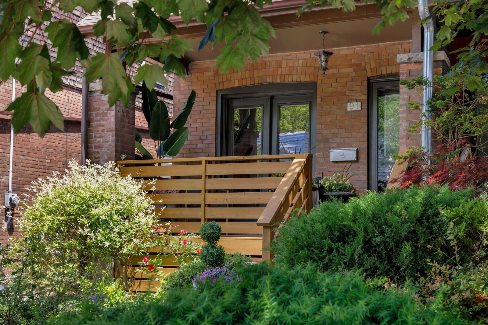 Close-up of the refreshed deck behind the front garden