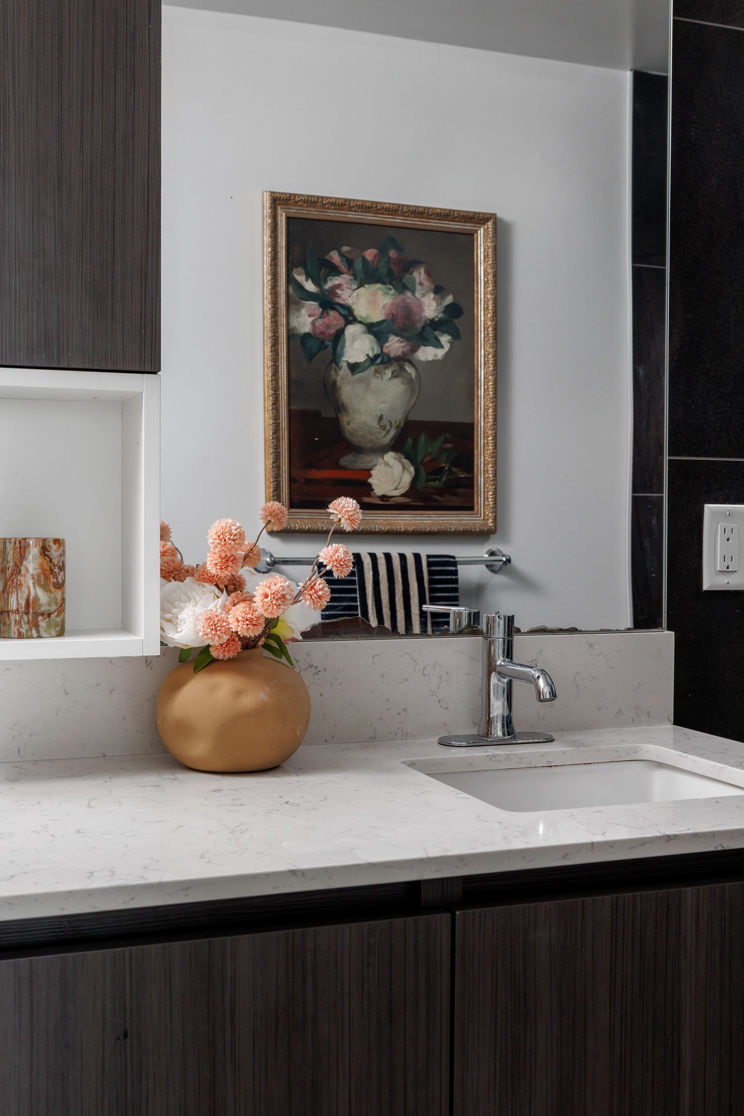 Bathroom vanity with a floral painting